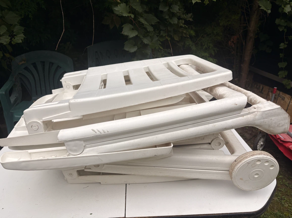 Set of Two White Plastic Patio Lounge Chairs
