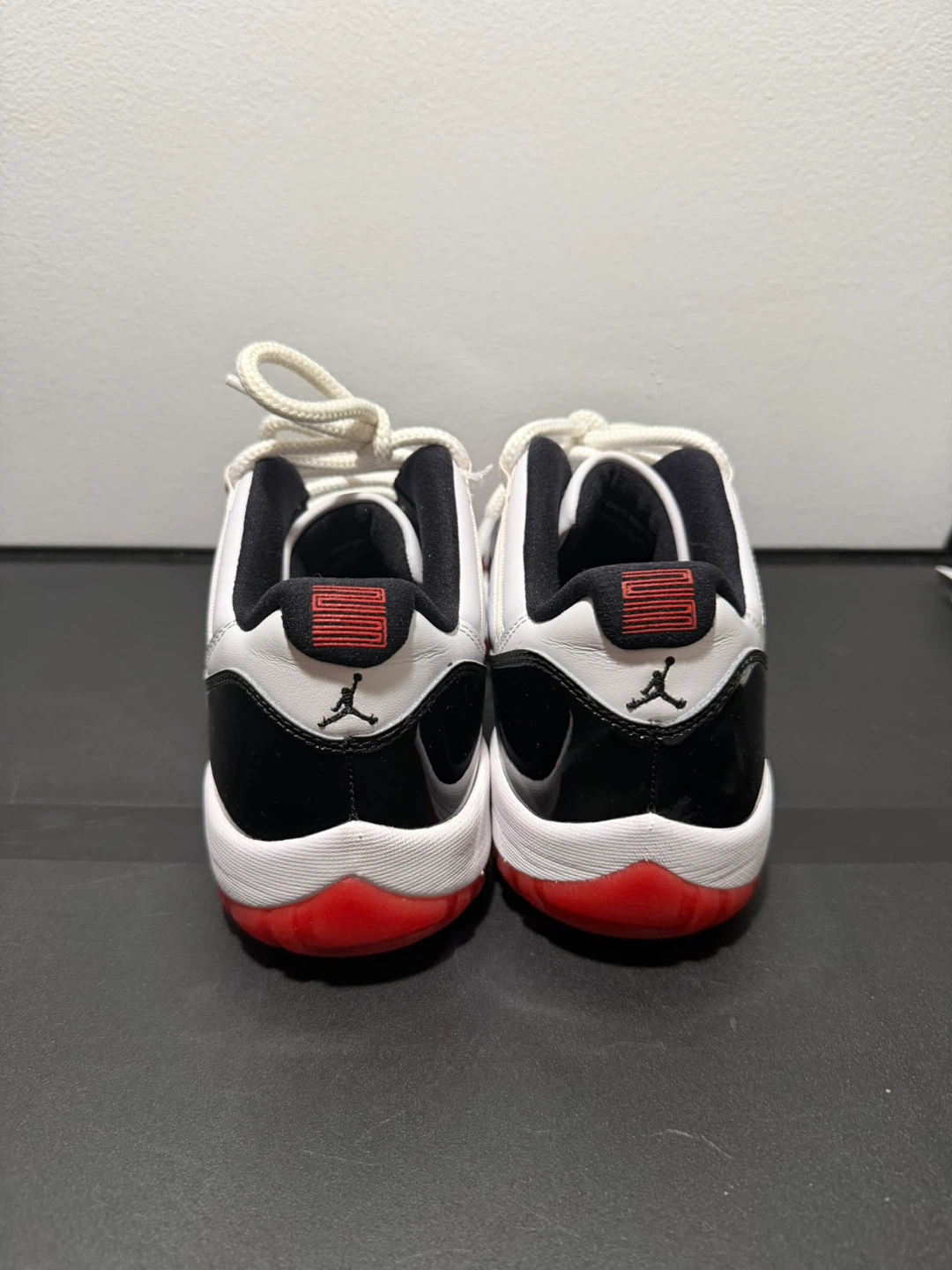 Air Jordan 11 Low White Black Red - photo 4