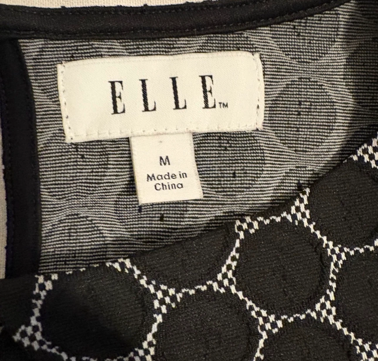 ELLE Black and White Polka Dot Peplum Top - photo 5