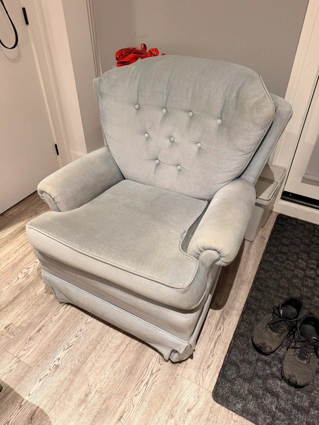 Light blue upholstered armchair