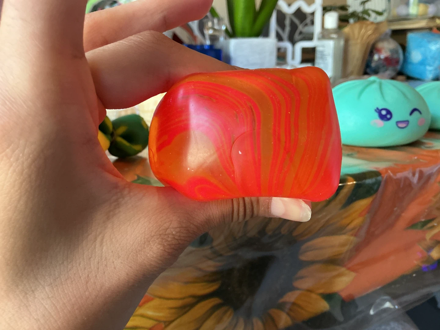 Orange and red swirl stress cube