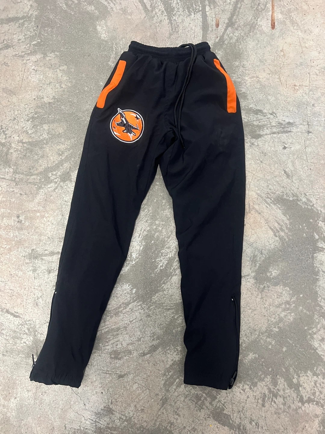 Black and Orange Jet Graphic Track Pants