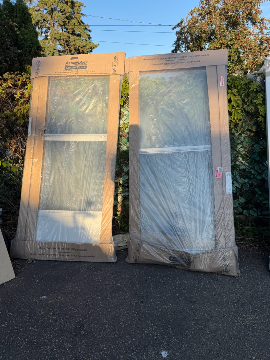Brand new storm doors
