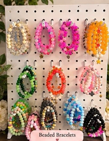 Assorted Beaded Bracelets and Keychains with pens and ID holders