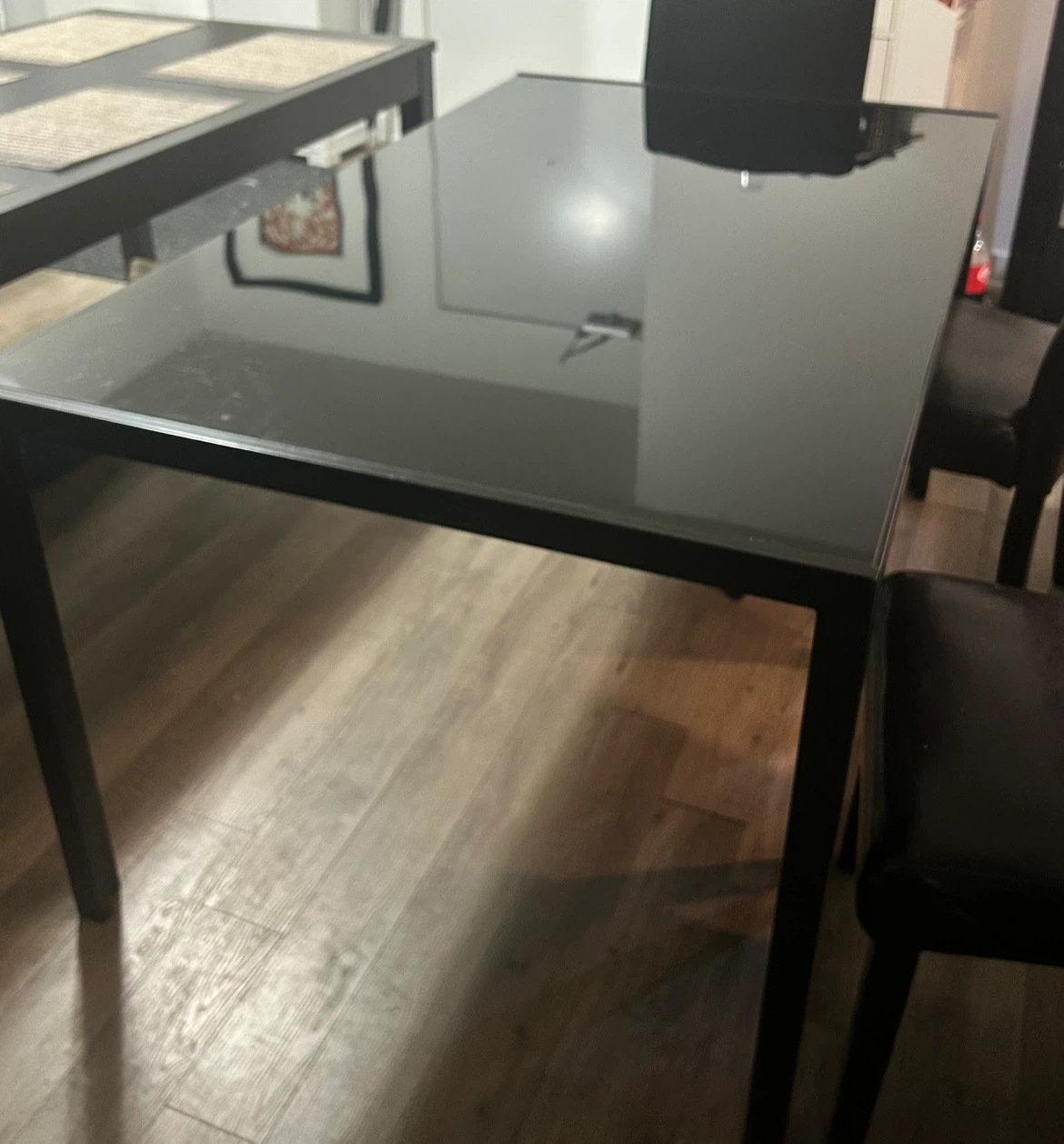 Black glass dining table