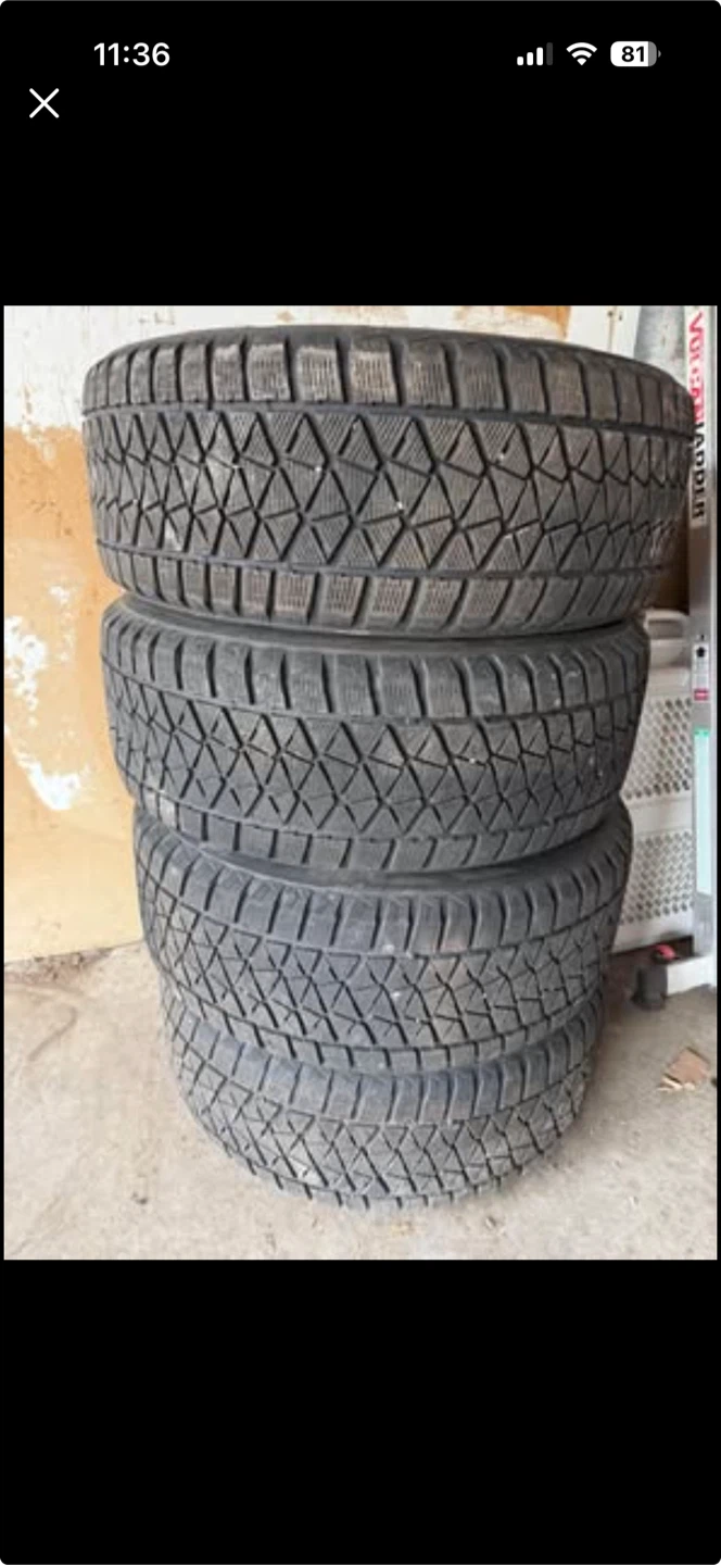 Set of 4 Bridgestone Blizzak Tires on Ford Wheels