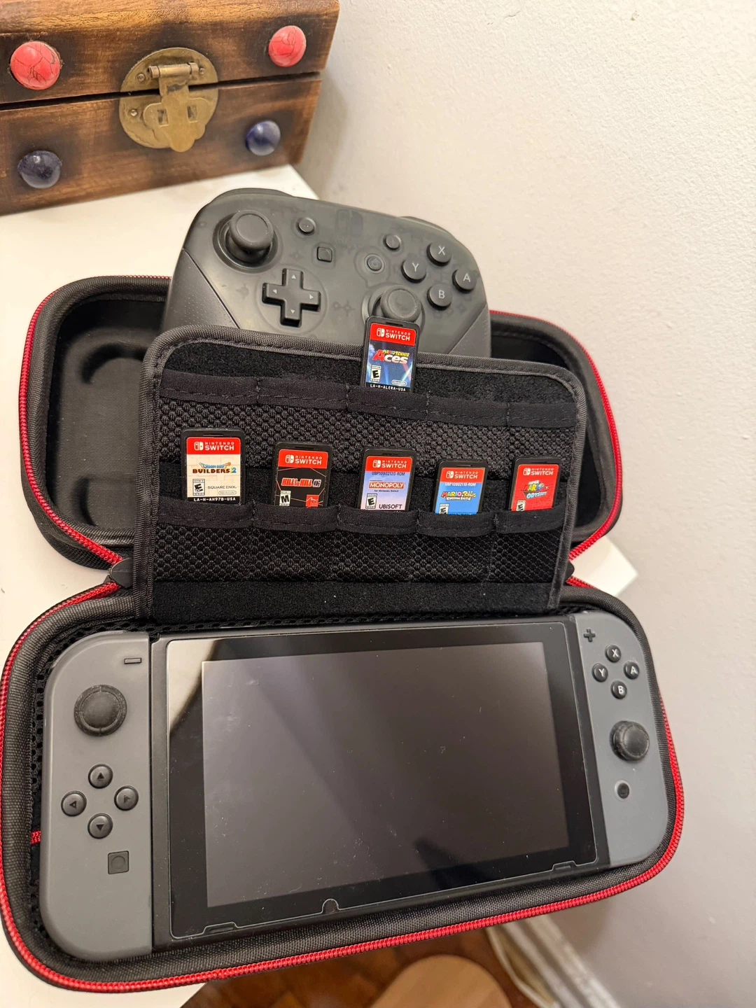 Nintendo Switch Console with Pro Controller and 6 Games - photo 2
