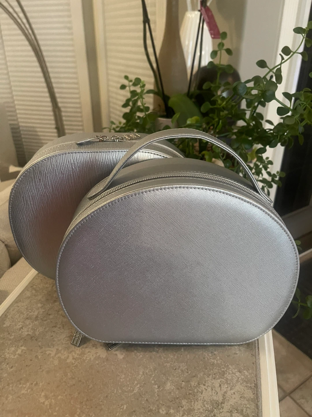 2 Silver Round Cosmetic Cases
