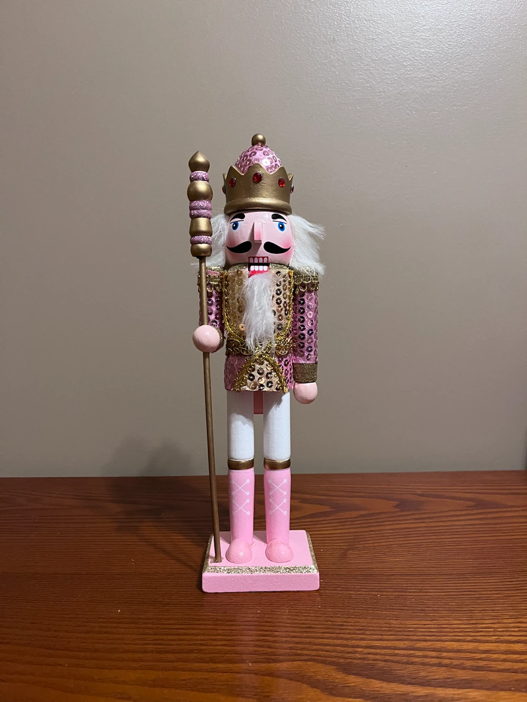 PINK/GOLD SEQUENCE WOODEN NUTCRACKER