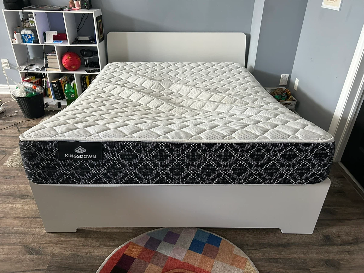 Kingsdown Mattress with White Bed Frame