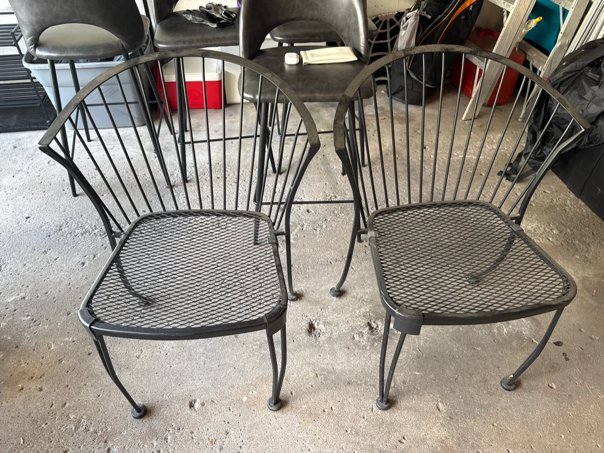 Set of 2 black metal patio chairs