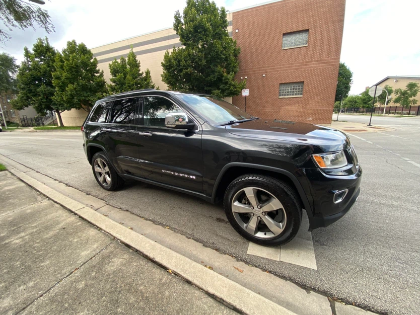2014 JEEP GRAND CHEROKEE LIMITED $5600 - photo 5