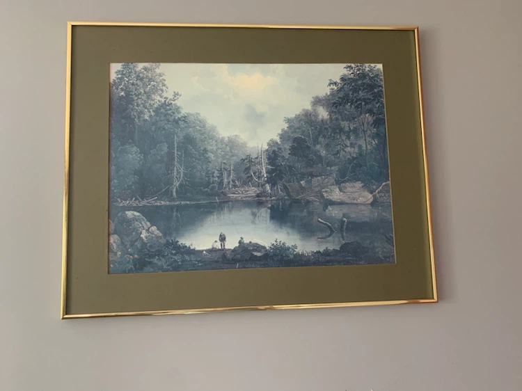 Landscape print with gold frame