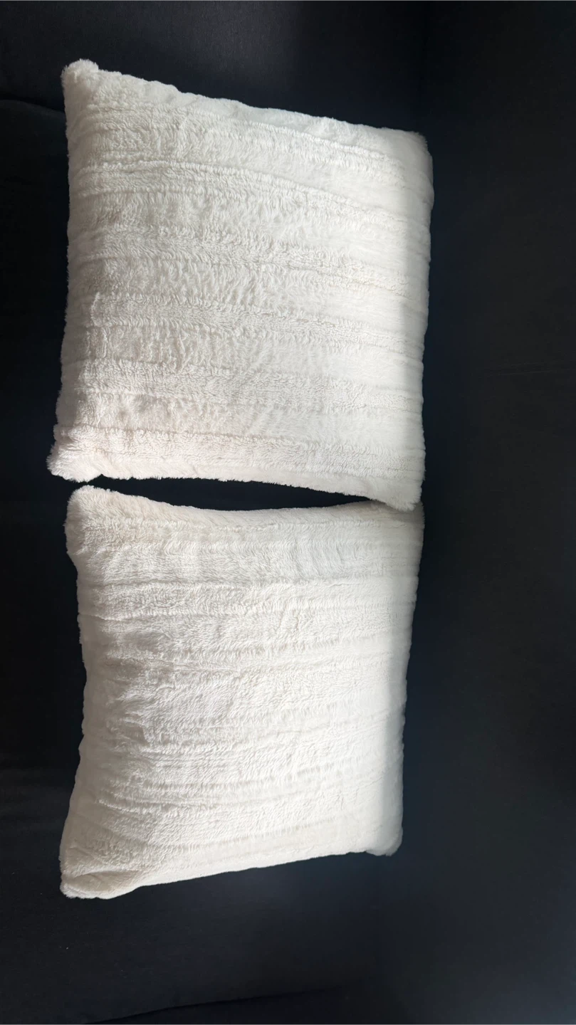 Two White Textured Throw Pillows