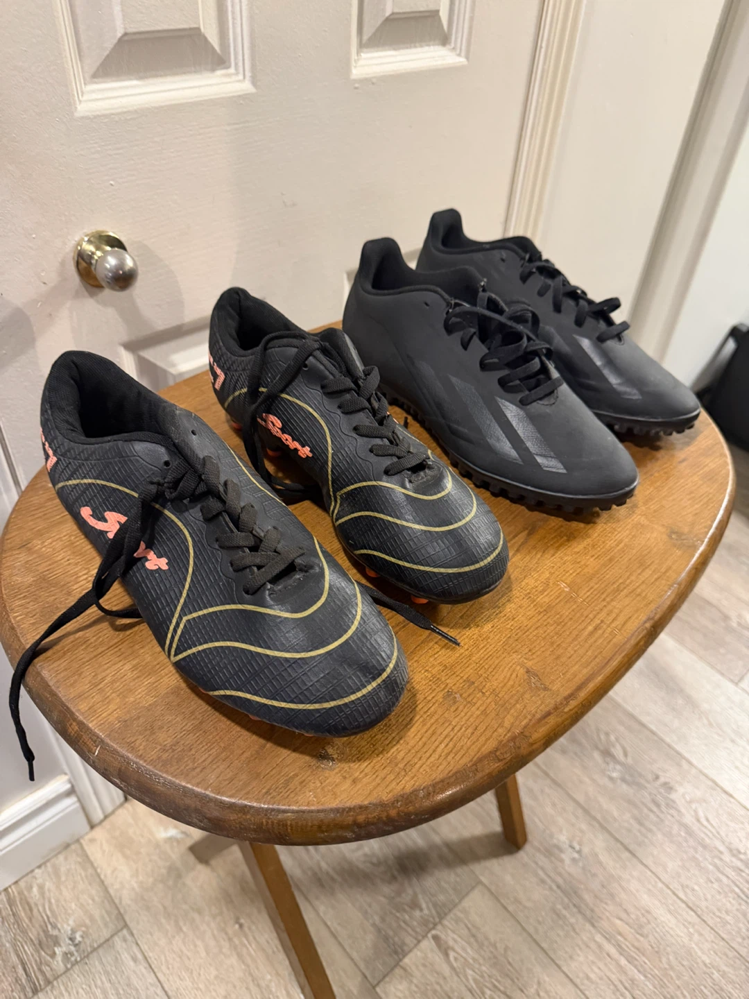 Two pairs of soccer cleats