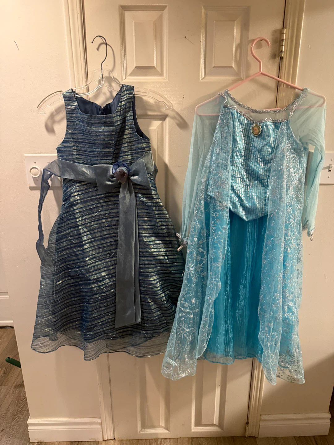 Two girls' formal and dress-up gowns