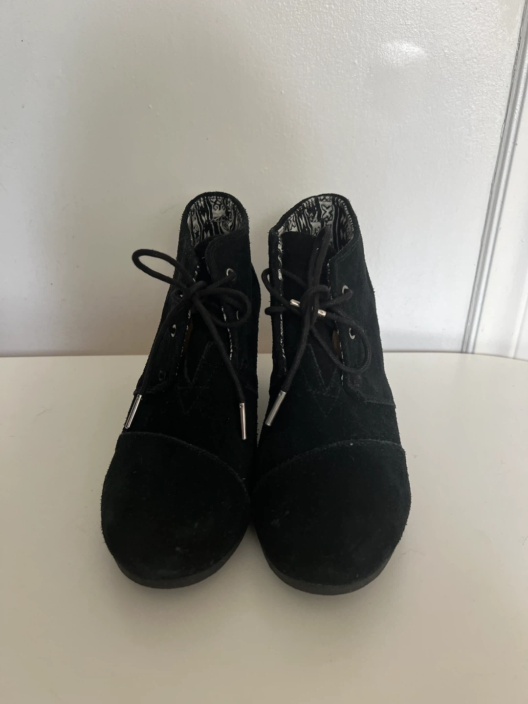 TOMS black suede wedge booties