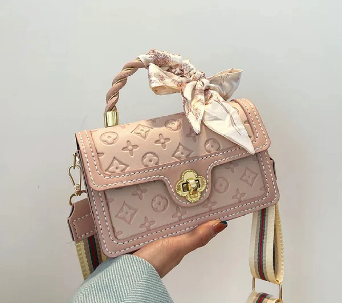 Pink Embossed Monogram Crossbody Bag