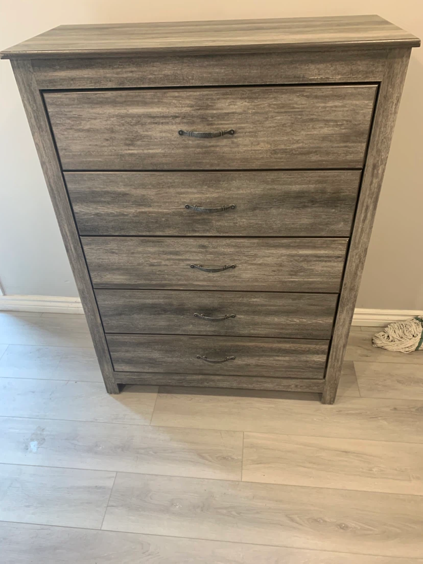 Five-drawer dresser in weathered grey finish