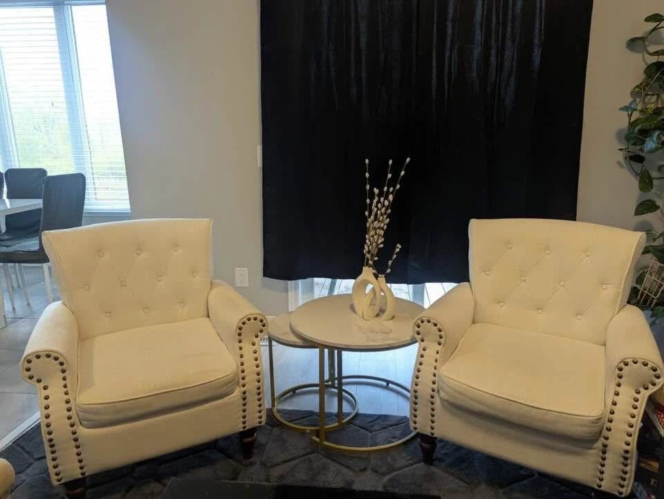 Two Tufted Armchairs