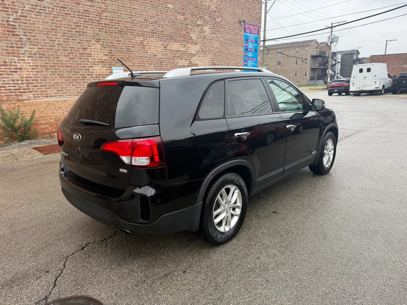 Black Kia Sorento SUV - photo 3