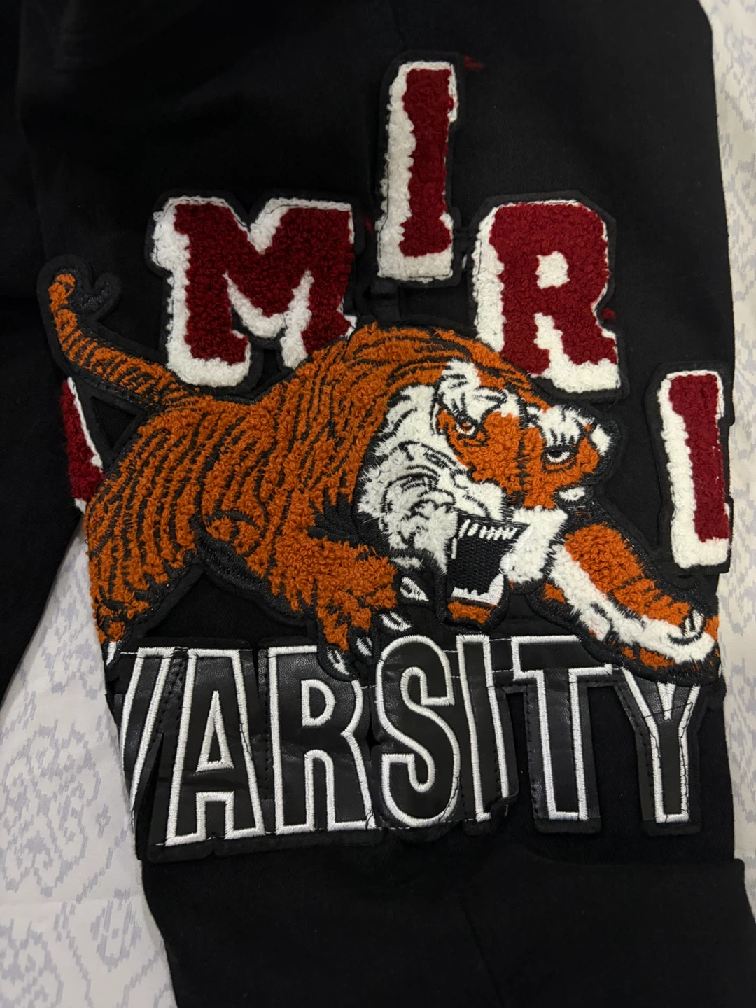 Amiri Black Tiger Varsity Jeans - photo 5