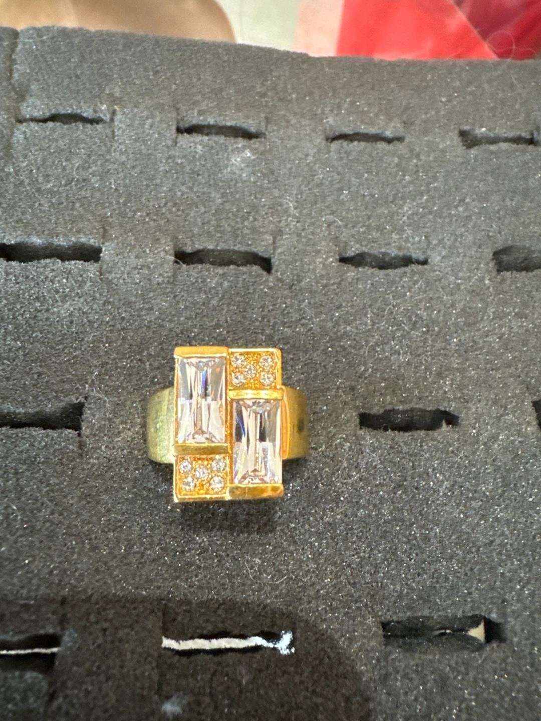 Gold-tone ring with clear rectangular stones