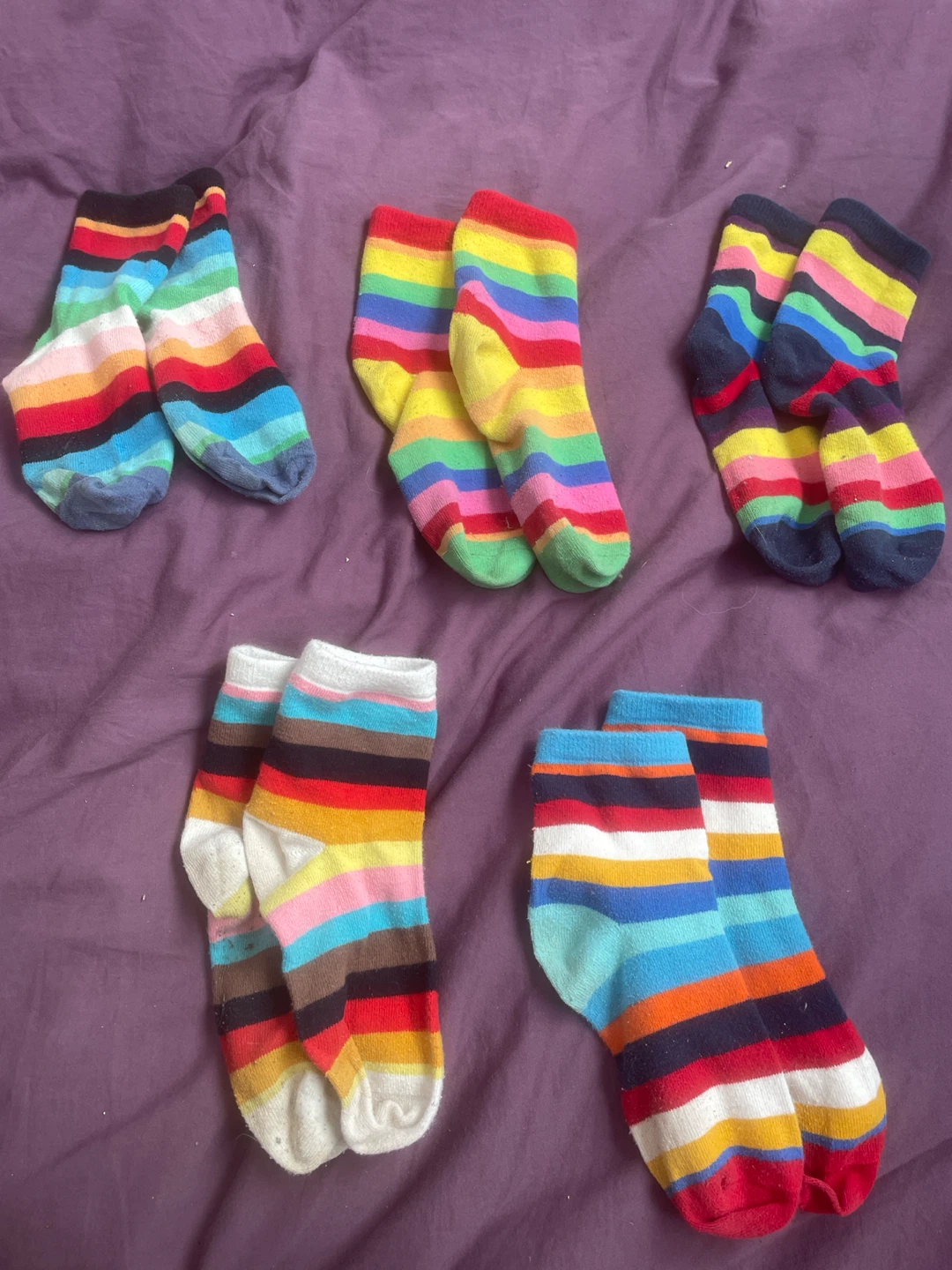 Five pairs of assorted kids striped socks
