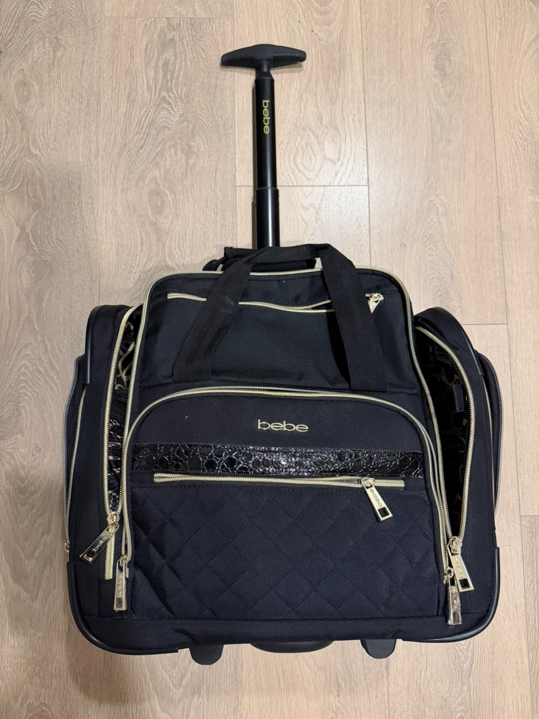bebe Rolling Carry-On Luggage Case