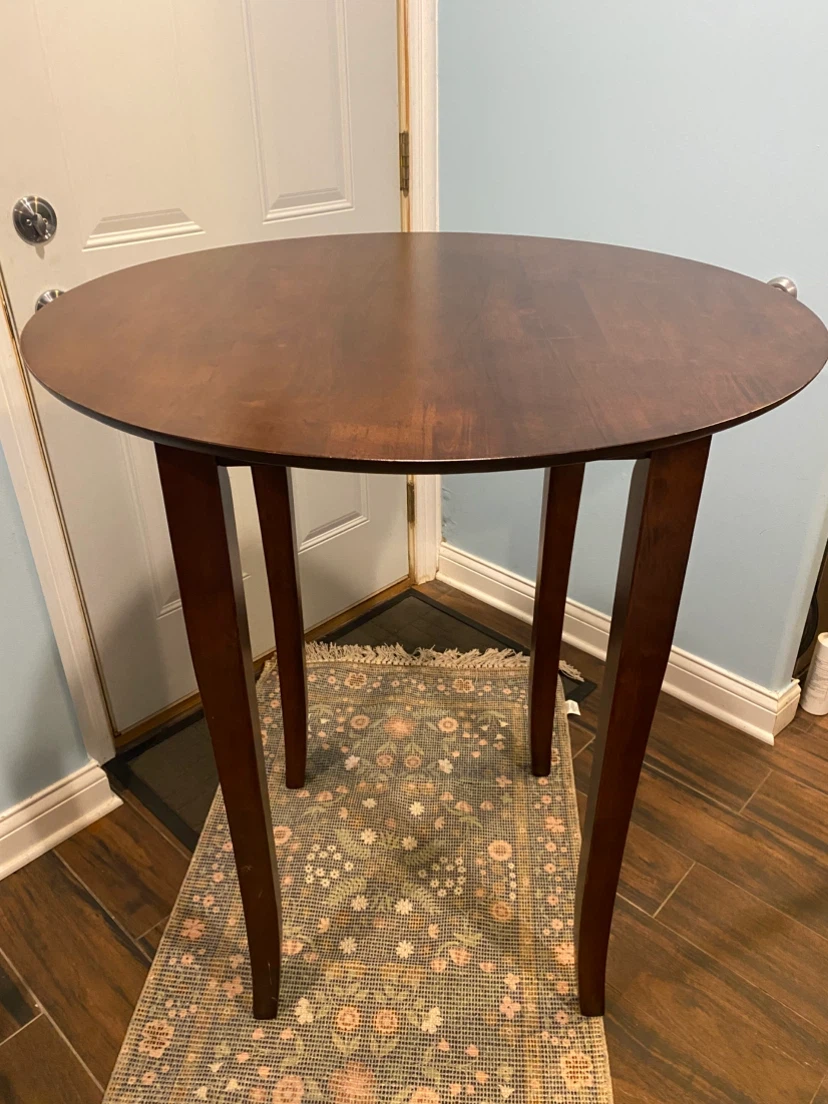 Round wooden side table