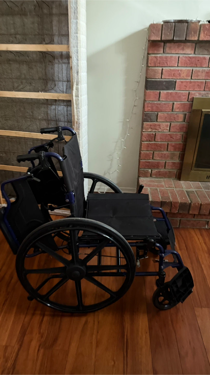 Blue folding wheelchair