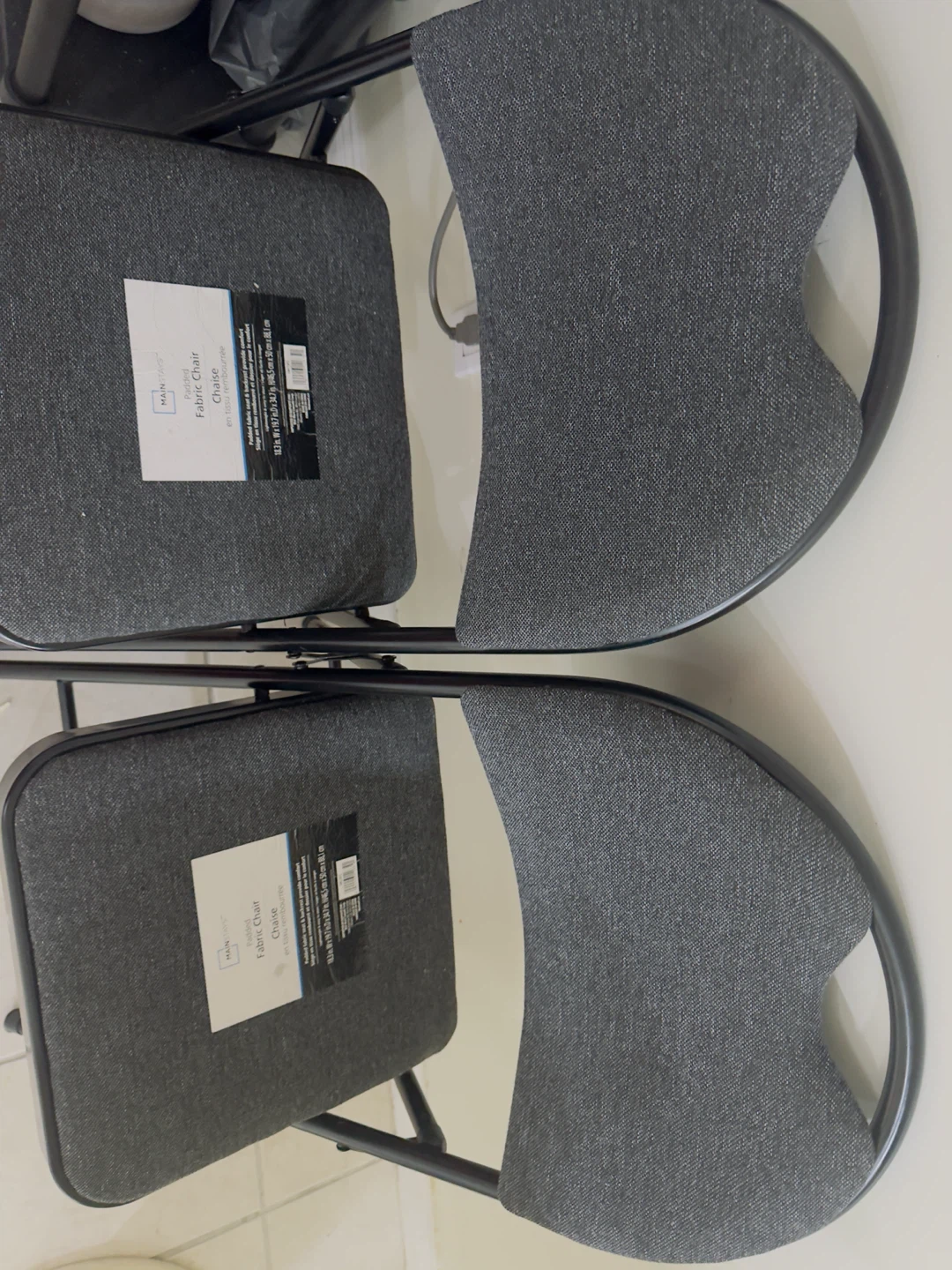 Two Mainstays Padded Fabric Folding Chairs - photo 3