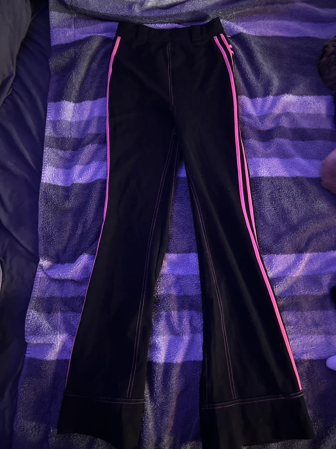 Black flare pants with pink stripe