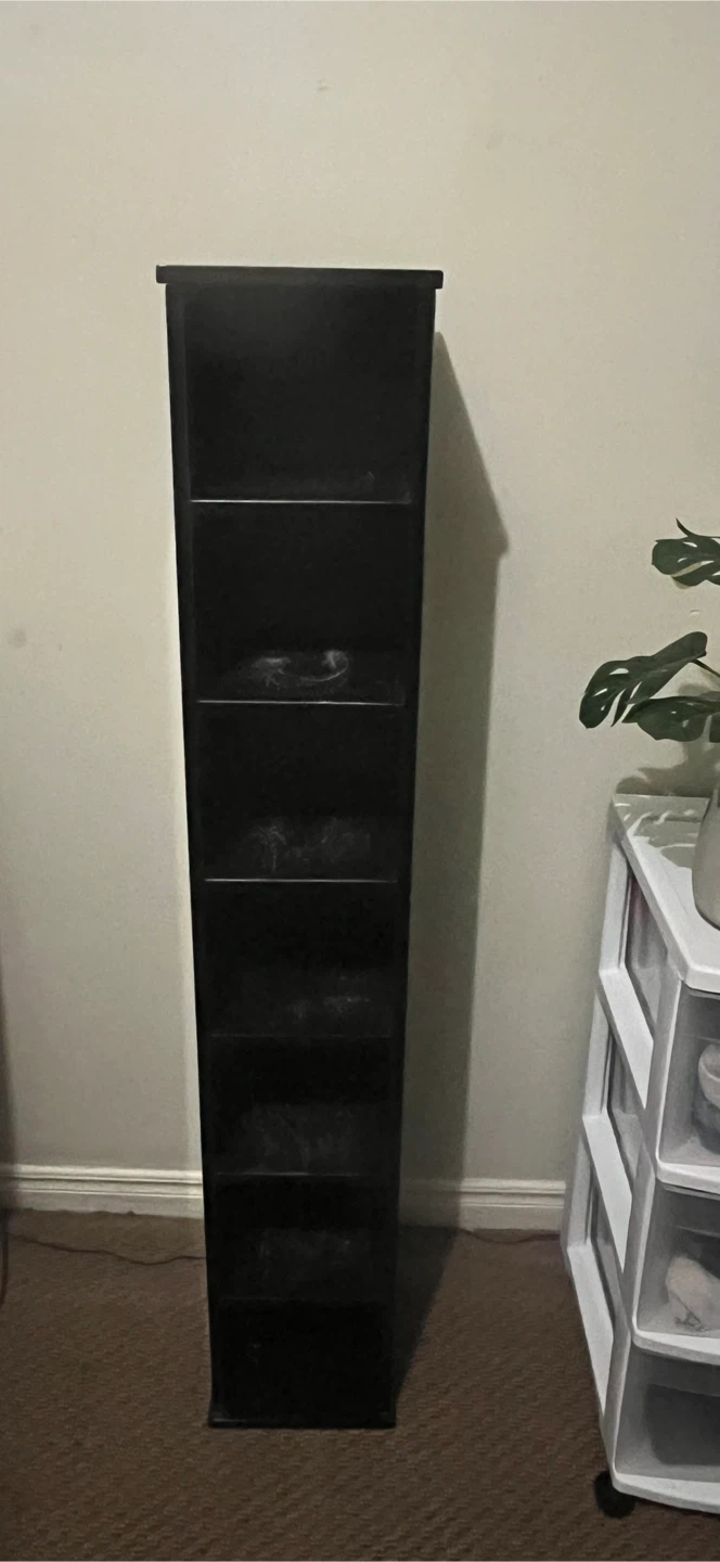 Tall Black Media Storage Tower
