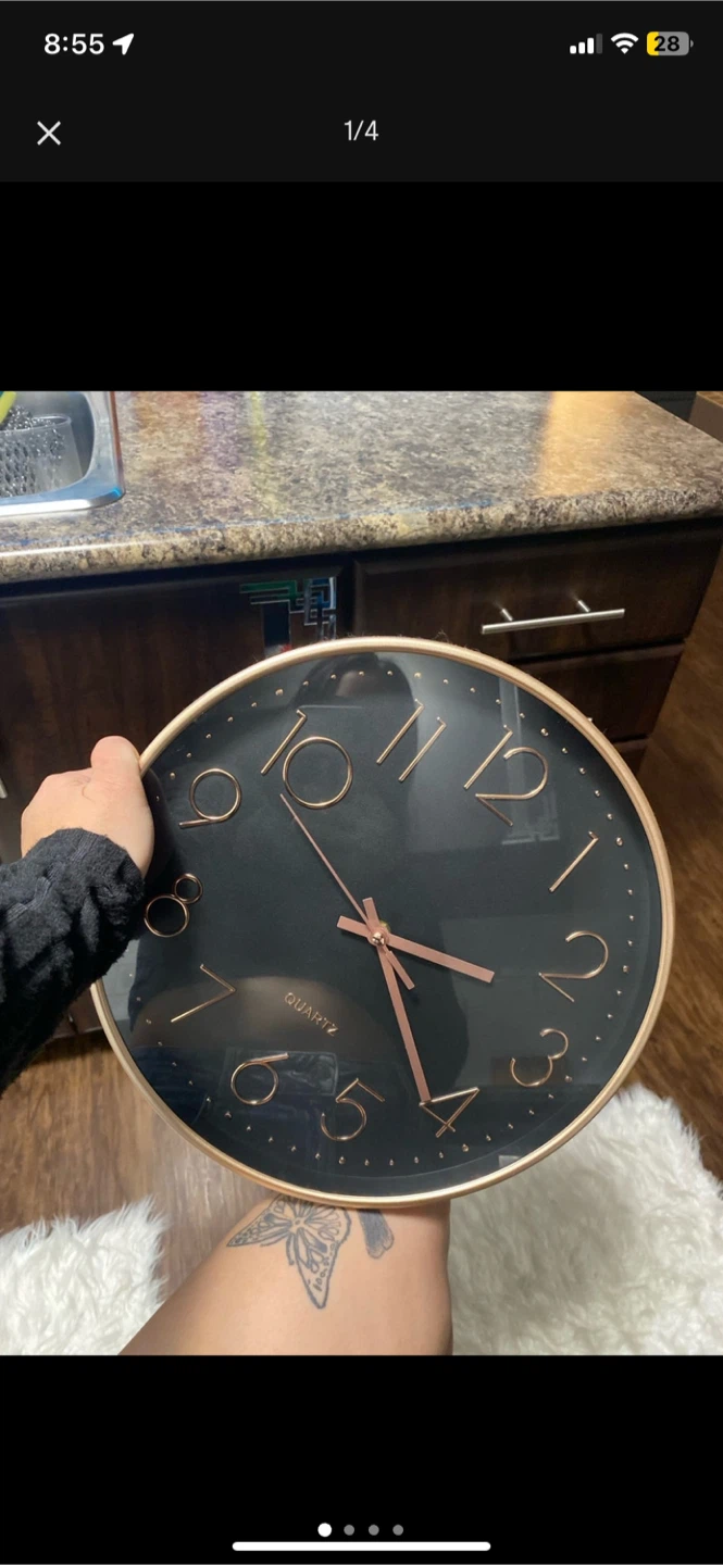 Black and gold wall clock