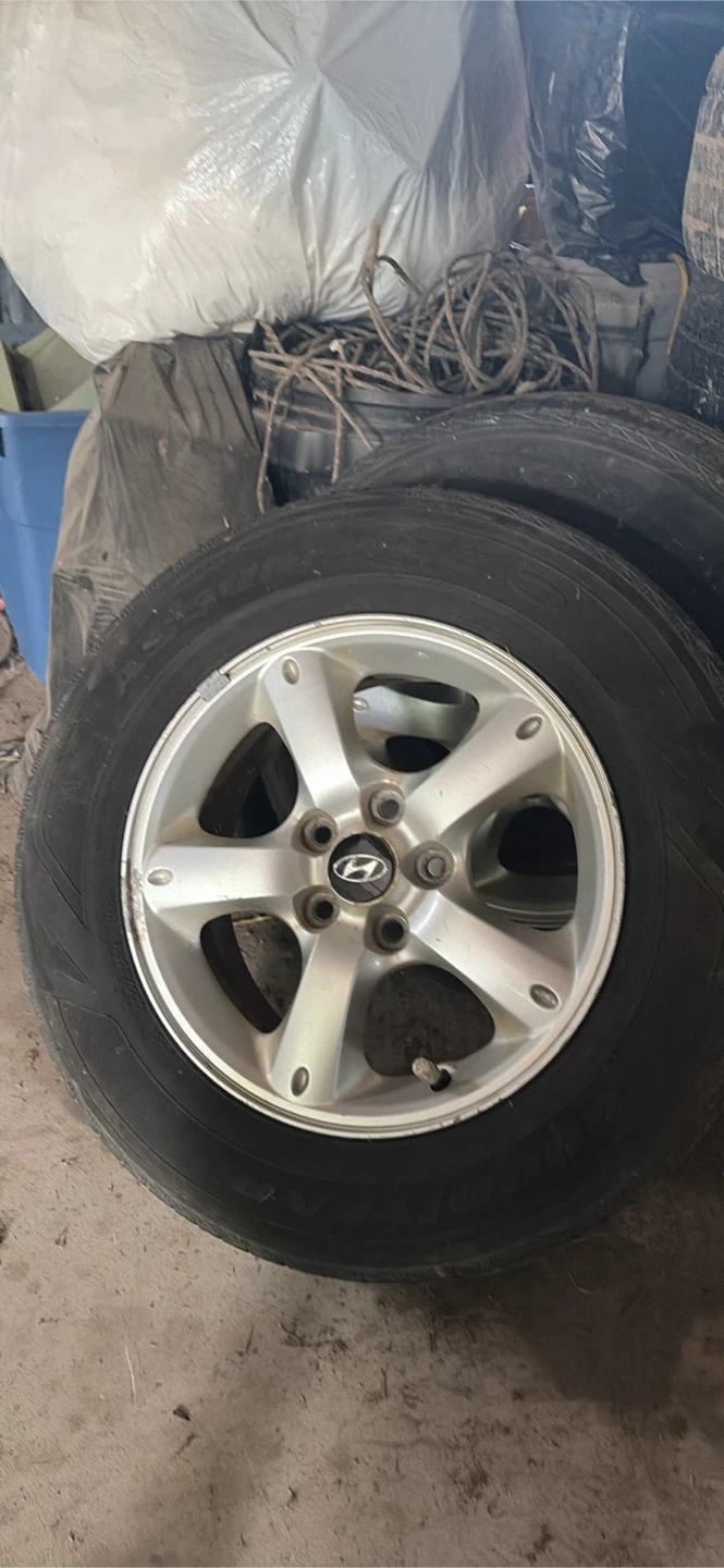 Set of 4 Assurance tires 225/65R16 on RIM