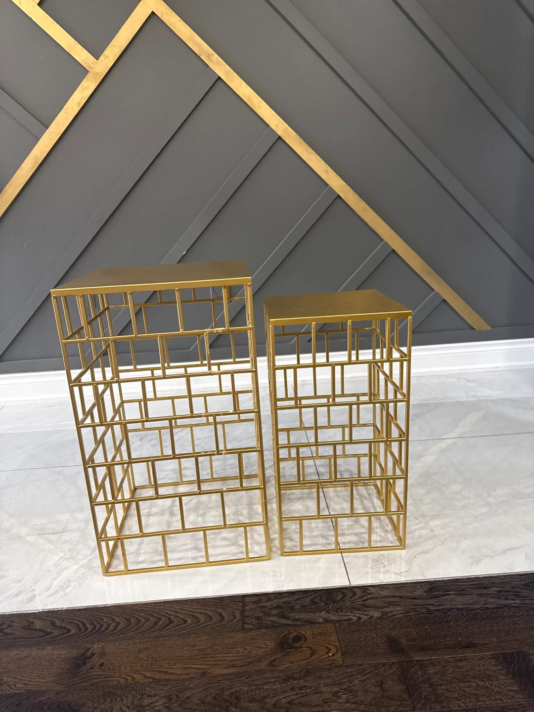 Set of two gold metal nesting side tables