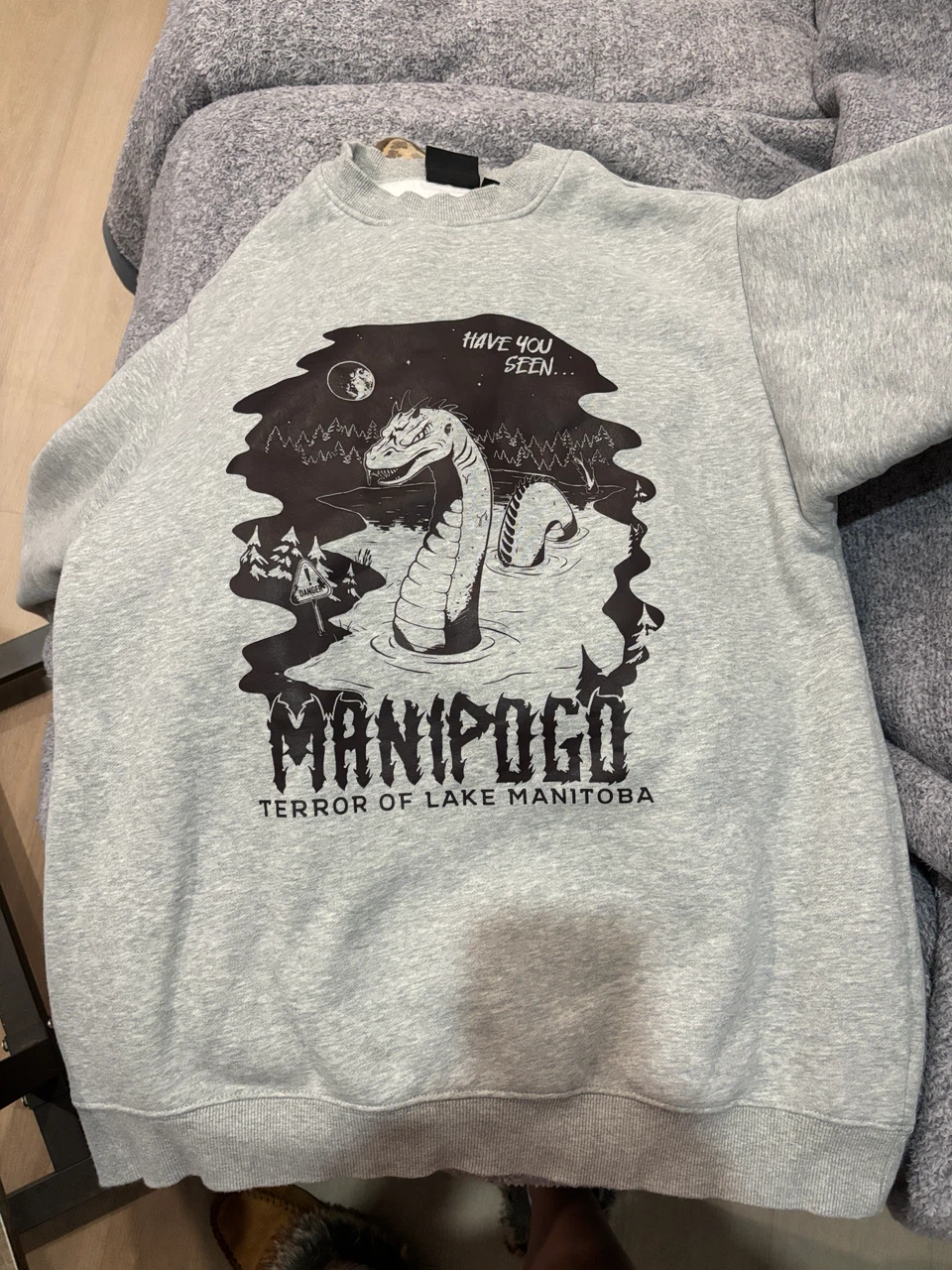 Cryptid Manipogo Grey Crewneck Sweatshirt