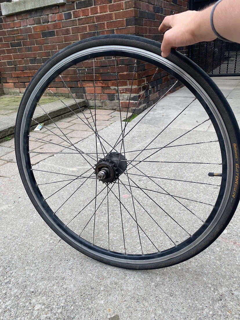 RearBicycle wheel with Continental Gatorskin tire