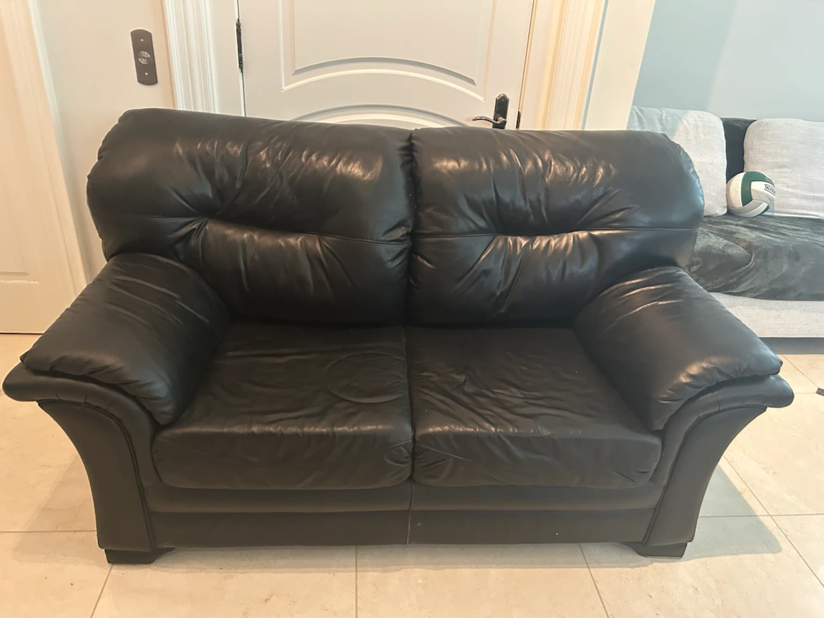 Black leather loveseat