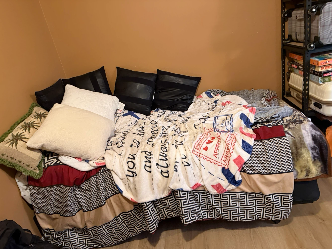 Twin bed with blankets and pillows - photo 2