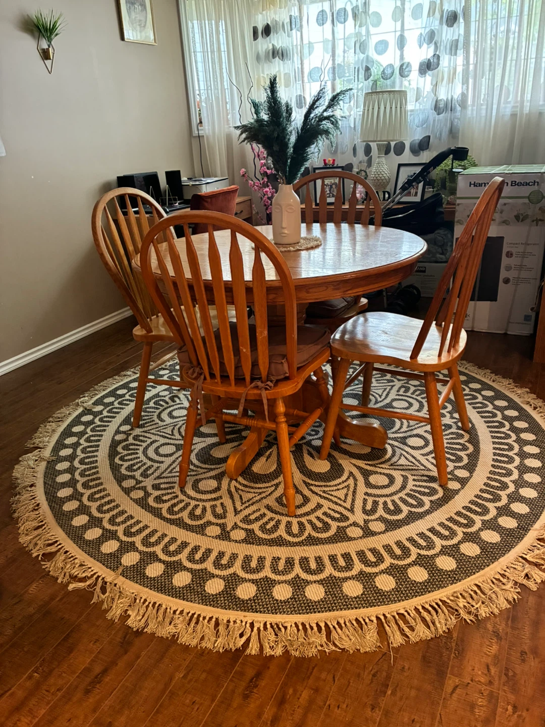 Round wooden dining table and 4 chairs
