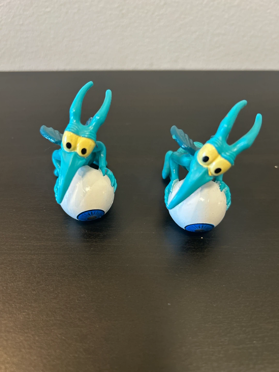 Two Blue Winged Creature Figures with Eyeballs - photo 2