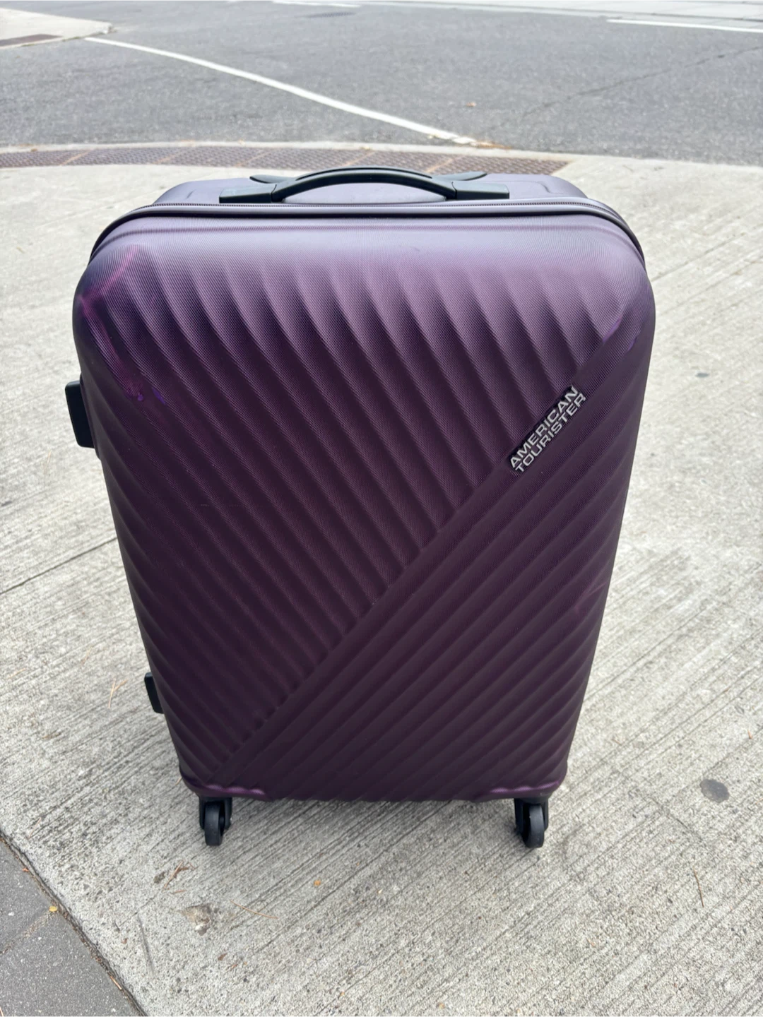 Medium American Tourister Spinner Luggage