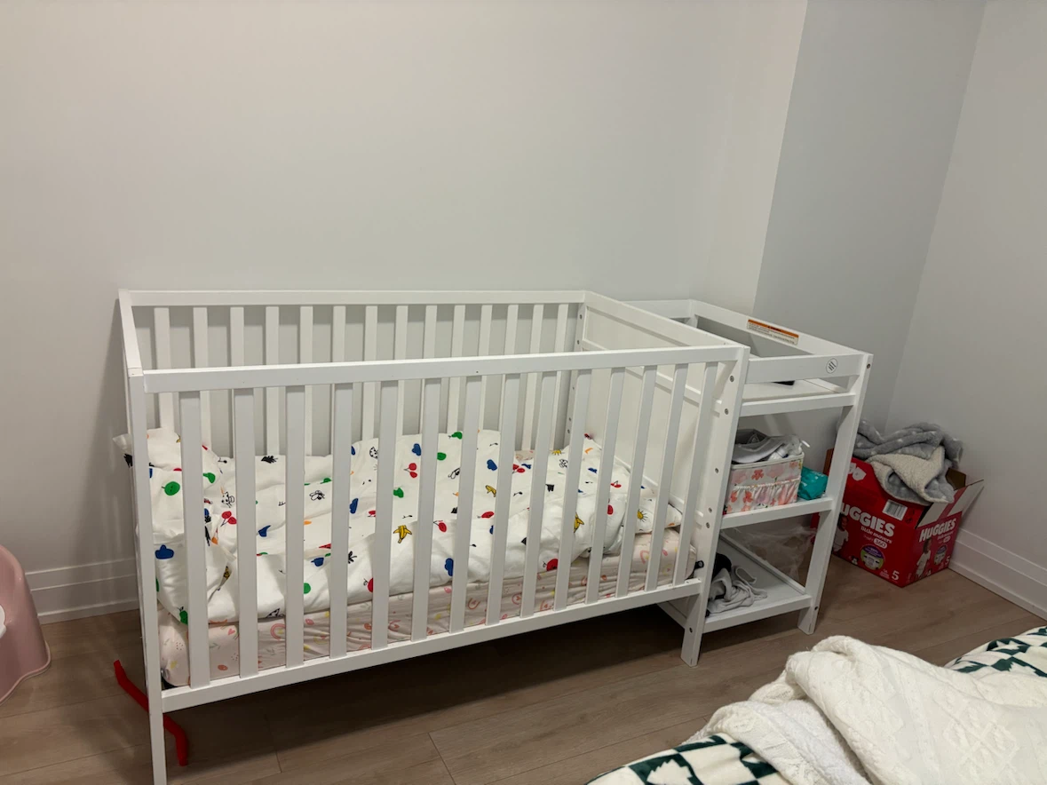 White Baby Crib with Attached Changing Table