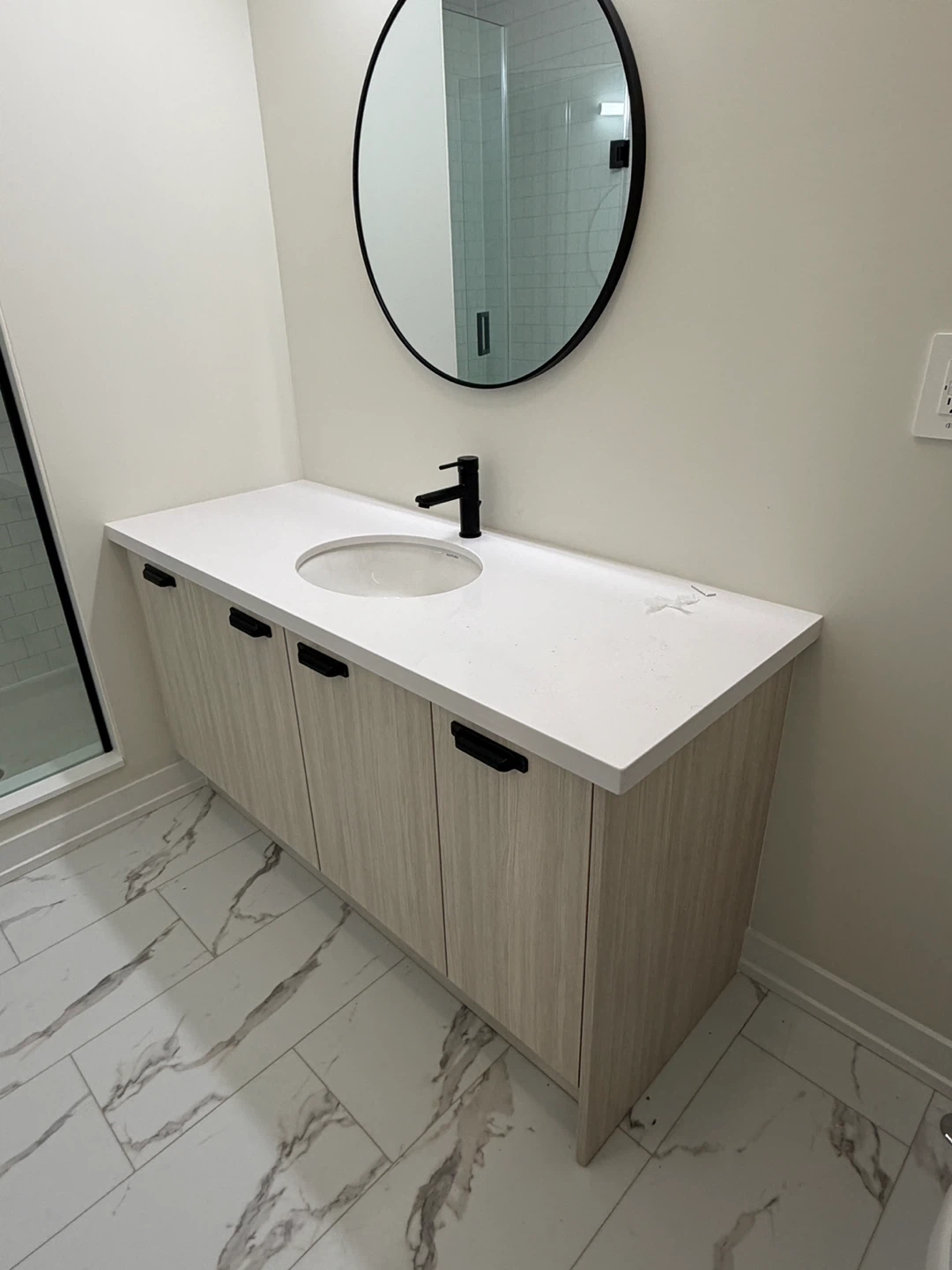 Brand new washroom vanity with Delta faucet and sink