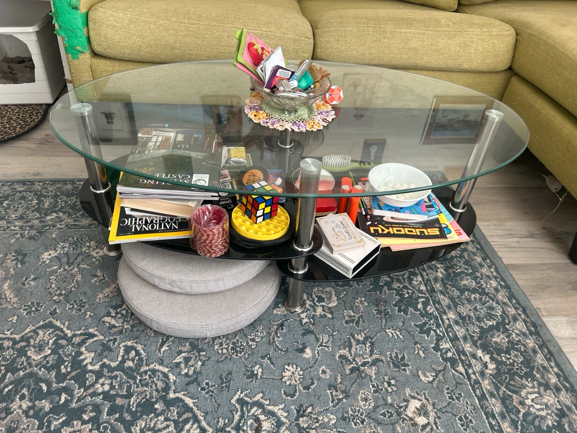 Oval Glass Coffee Table with Black Lower Shelf