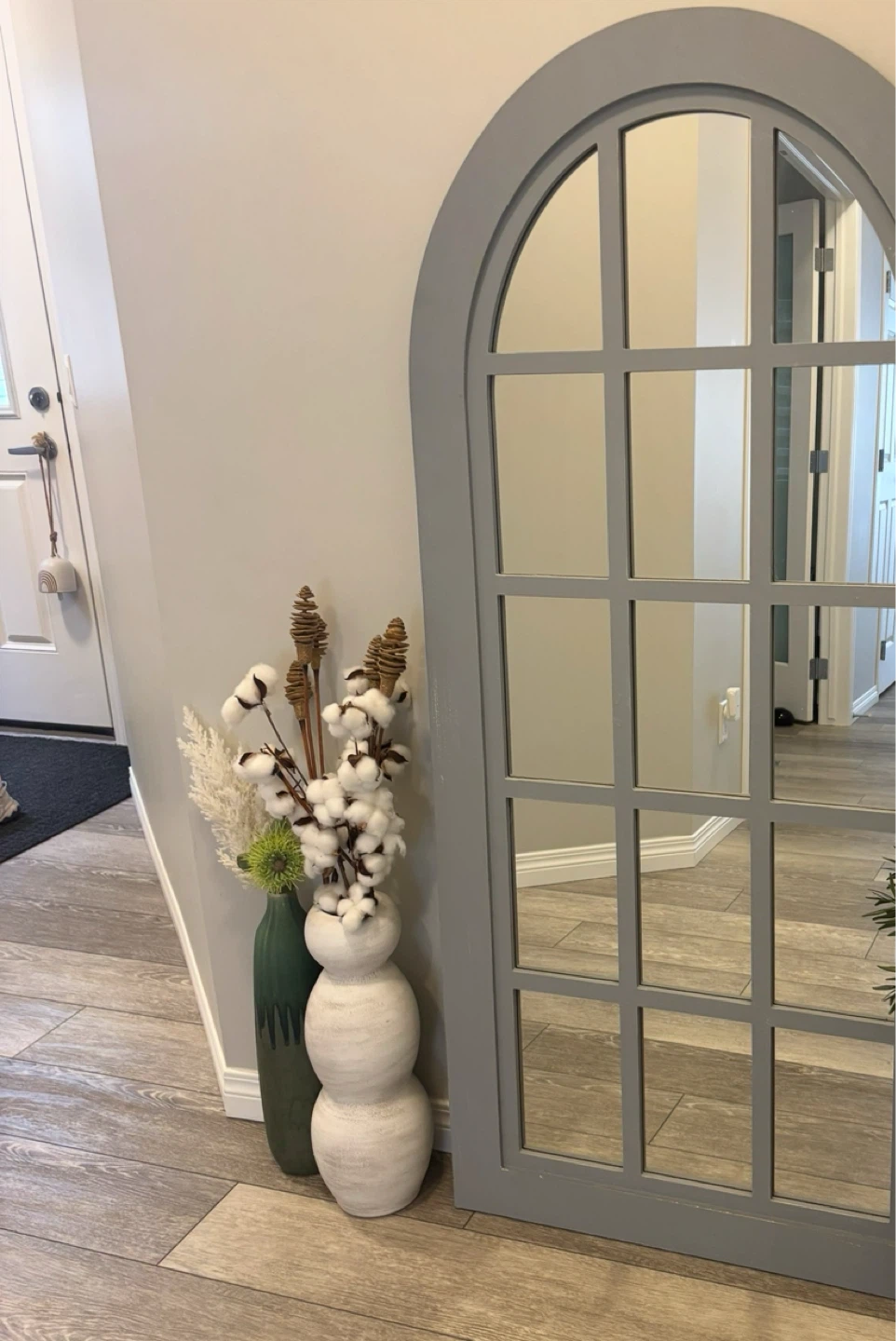 Floor vase with artificial flowers