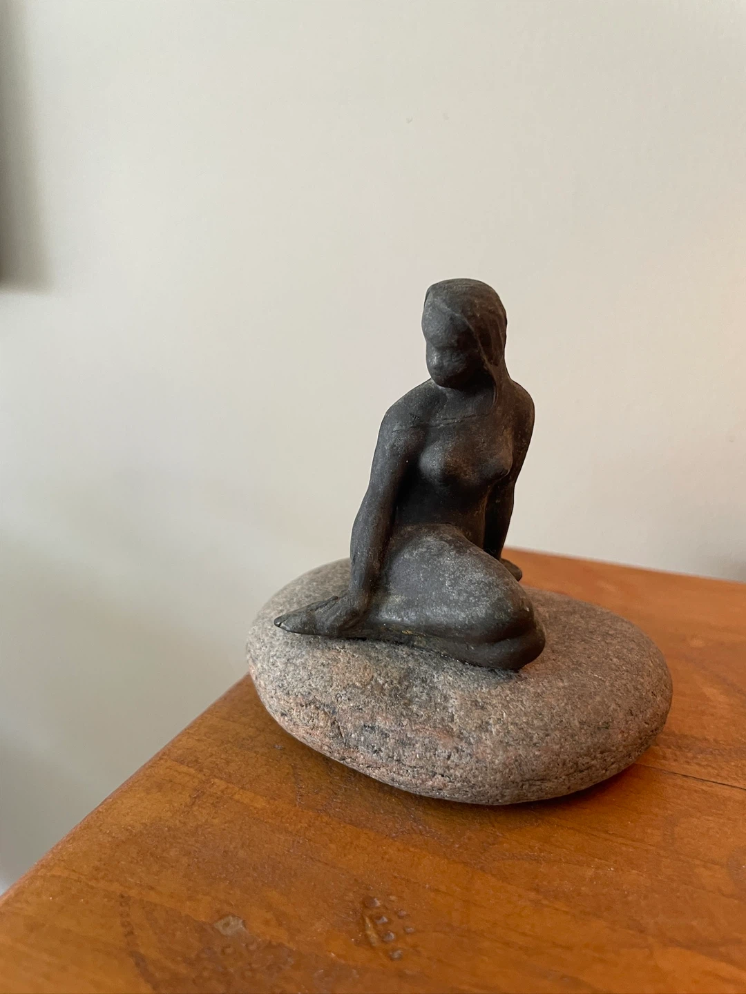 Vintage Metal Mermaid Sculpture on stone