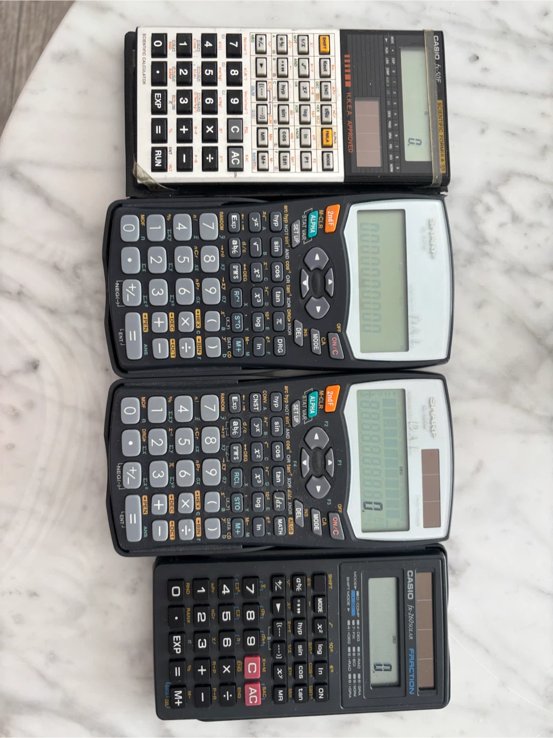4 Scientific Calculators